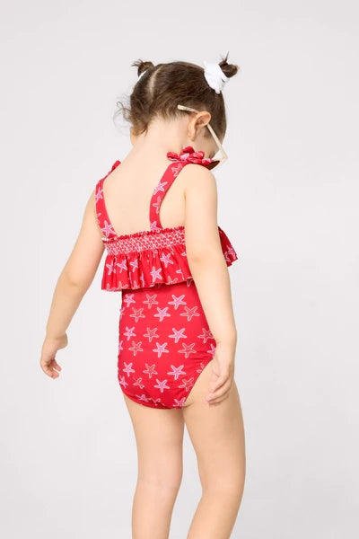 YSABEL MORA COSTUME Costume da bagno da bambina con volant stampato a stelle marine 95141