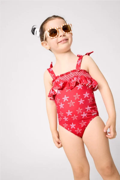 YSABEL MORA COSTUME Costume da bagno da bambina con volant stampato a stelle marine 95141