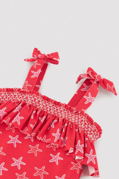 YSABEL MORA COSTUME Costume da bagno da bambina con volant stampato a stelle marine 95141