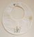 BABYGI BAVETTA LINO BIANCO CON FIORI RICAMATI LN23G