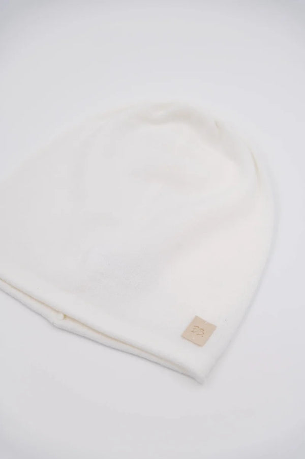 BAMBOOM BERRETTINO CON BORDO A RULLINO WARM WHITE