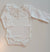 BABYGI BODY CON COLLETTO PUNTO SMOCK BIANCO/ROSA