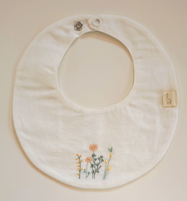 BABYGI BAVETTA LINO BIANCO CON FIORI RICAMATI LN23G
