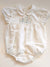 BABYGI PAGLIACCETTO LINO BIANCO CON FIORI RICAMATI LN48G