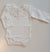 BABYGI BODY CON COLLETTO PUNTO SMOCK BIANCO/ROSA